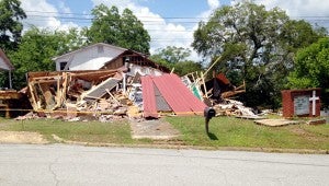 SUBMITTED PHOTO The Trinity Missionary Baptist Church was demolished on July 7 due to structural damage. The congregation is holding multiple fundraisers and accepting monetary donations to help fund the rebuilding of the church.