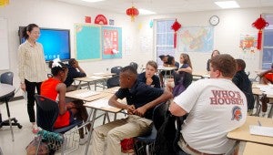 MESSENGER PHOTO/SCOTTIE BROWN The Confucius Institute classroom is underway at Charles Henderson Middle School. Ms. Duan, far left, is the teacher for the new class.