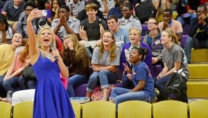 MESSENGER PHOTO/COURTNEY PATTERSON Miss Alabama Meg McGuffin spoke to GHS about her platform, “Healthy is the New Skinny,” Wednesday as part of the GEAR UP kick off this week. McGuffin takes a selfie with the students.
