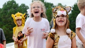 MESSENGER PHOTO/COURTNEY PATTERSON Pike Liberal Arts School held its annual homecoming parade Thursday. PLAS students dressed up as “Lion King” characters.