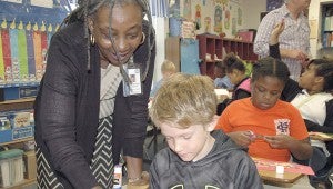 MESSENGER PHOTO/JAINE TREADWELL Councilwoman DeJerilyn Henderson was present at the second and third grade classes a Troy Elementary School Tuesday morning.