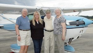 MESSENGER PHOTO/JAINE TREADWELL Pictured, from left, are Cathy McKinney, Russell’s niece; Cheryl Page Yawn, longtime friend of Russel’s and experienced pilot; Russell and Nora Stephens, Russell’s niece.