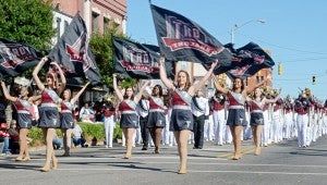 MESSENGER PHOTO/COURTNEY PATTERSON The Square in Downtown Troy was lined with people in the community, alumni, family and friends Saturday for the annual Troy University Appreciation Day Parade before the homecoming game began that afternoon.