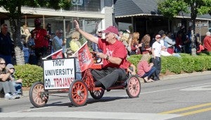 MESSENGER PHOTO/COURTNEY PATTERSON The Square in Downtown Troy was lined with people in the community, alumni, family and friends Saturday for the annual Troy University Appreciation Day Parade before the homecoming game began that afternoon.