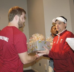MESSENGER PHOTO/JAINE TREADWELL Troy University football players took time Wednesday morning to visit various facilities in Troy that provide much-needed services to the community. The players delivered gift baskets in appreciation for the vital roles the facilities play in the lives of city residents. Coach Neal Brown said he wants his players to realize the importance of giving back to their communities. Community is important and family is important, Brown said. The “football family” had Thanksgiving dinner together Thursday and the players’ families were invited to join them before the team boarded the bus for Atlanta and Friday’s game with Georgia State.