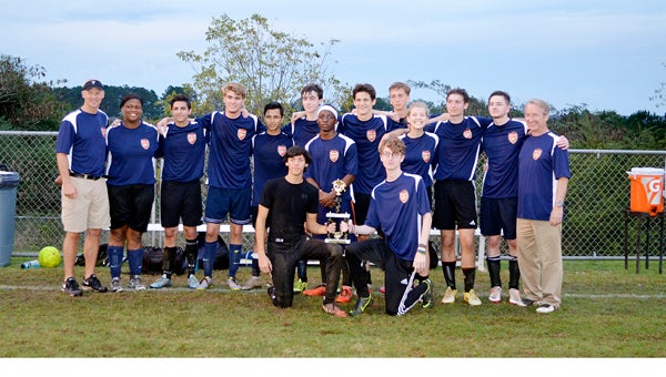 submitted Photo The 18&U FC Troy Arsenal soccer team won the district soccer tournament this weekend and will travel to the state tournament on Nov. 21. Back row from left to right: Coach Steve Grice, Breanna Guice, Adam Bensinger, Chase Haney, Oscar Castelan, Brady Balkcom, DJ Brooks, Baylor Barnes, Perry Bunn and Alex McLendon. Front row: Connor Adler and coach Scott McLendon. Not pictured: Cole Wilson and coach Jay Wilson. 