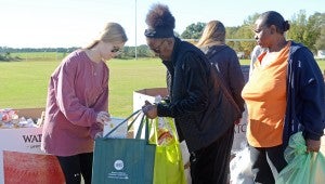 MESSENGER PHOTO/COURTNEY PATTERSON I Choose Life Ministries provided Thanksgiving meals for about 1,000 families Friday.