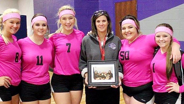submitted Photo Goshen softball and volleyball head coach Amy Warrick posing with her senior volleyball players. Amy Warrick and the Goshen Eagles softball and volleyball teams enjoyed success during their 2015 seasons.  