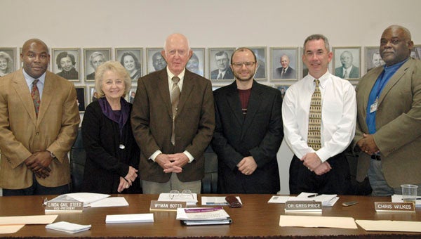 Messenger photo/Jaine Treadwell The Pike County Board of Education was honored with a reception Monday night prior to the board’s regular meeting. Pictured from left, Dr. Clint Foster, president; Linda Steed, vice president; Wyman Botts, Dr. Greg Price, Chris Wilkes and Rev. Earnest Green.