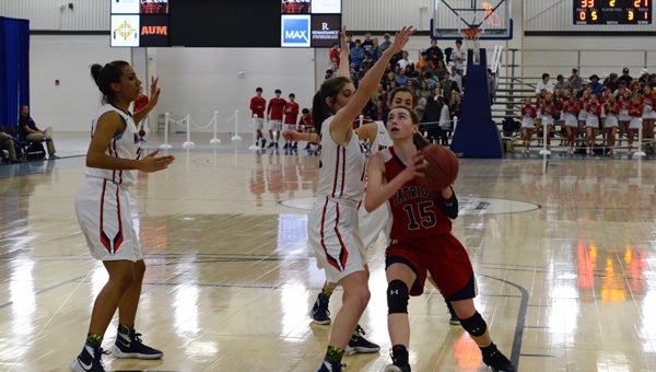 submitted Photo/debi green Lauren Johnson attempts to take a shot Thursday morning against Lee Scott in the Elite 8 state tournament in Montgomery. The Patriots fell to Lee Scott 45-37.