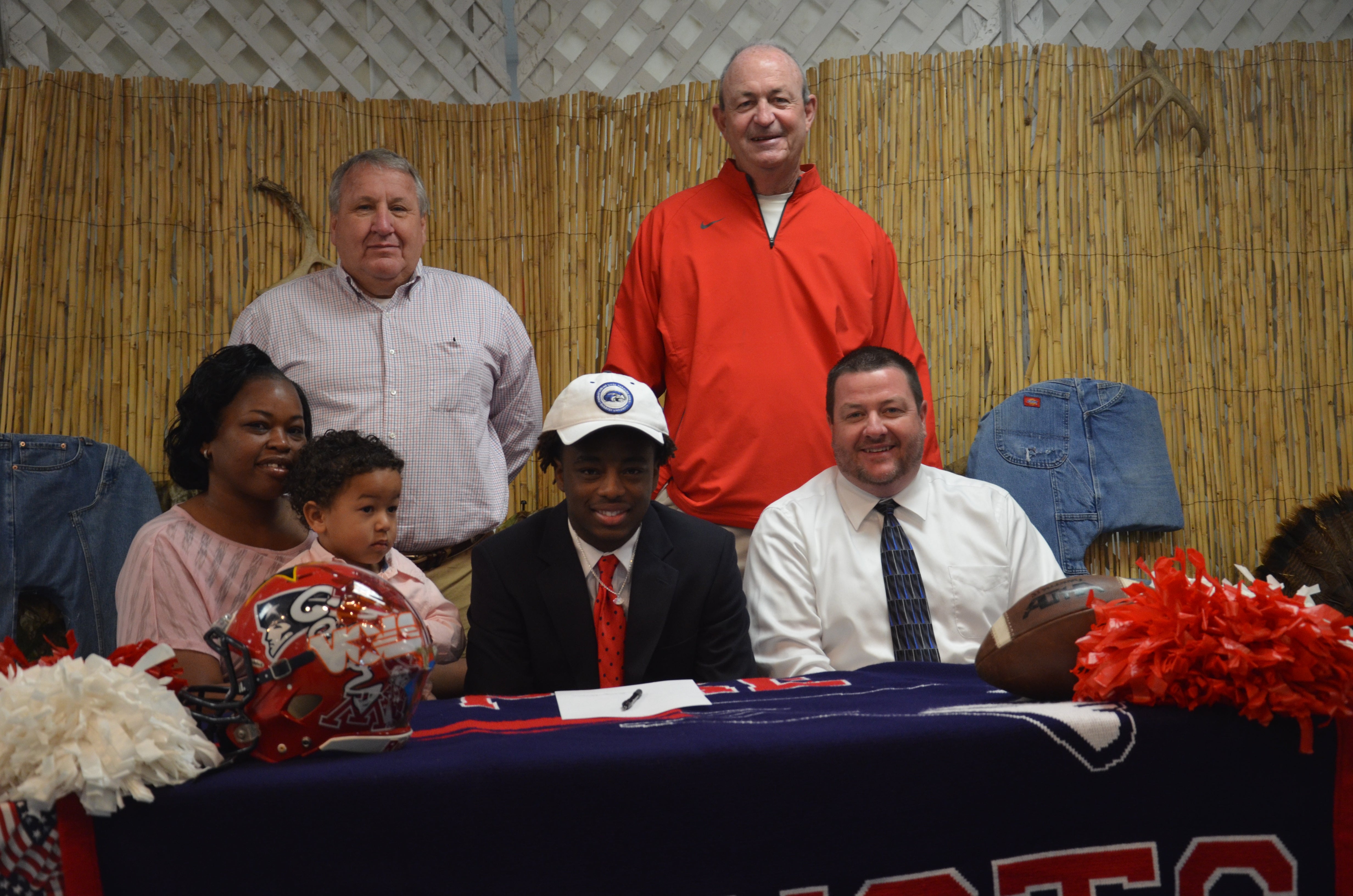 Messenger Photo/mike hensley Marquese Christian signed a scholarship Thursday morning inside the Pike Liberal Arts Cafeteria. Christian will be attending Shorter University in the fall.