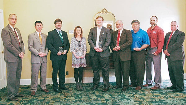 Seven members of the Pike County Chamber of Commerce were recognized Wednesday for outstanding business practices. Pictured from left, Mark Hayes, chamber board 3rd vice-chairman;  Adam Carson, Lockheed Martin; John Reeves, Cervera, Ralph, Reeves, Baker, Haistings; Jordan Cox, Troy Junior Women’s League; Troy Hidle, Chicken Salad Chic; John Little, SARAH; John Ramage, First National Bank; Jason Jones, Jones Medical Supply; and Jack Worthington, Chamber board chairman. Pictured below, Mayor Jason Reeves and Johnny Witherington, Troy City Council President attended the awards banquet and expressed appreciation to all the winners.