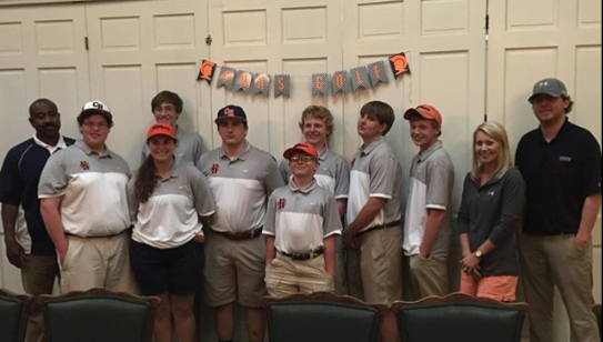 Submitted Photo Trojan golfers from left to right: Coach Shelby Tuck, Max Lee, Lindsay Lee, Carter Ray, Grant Wilkes, Griffin McCrary, Cody Paramore, Grant Baker, Will Worthington, Volunteer Assistant Coaches, Alyson Mitchell Stuart and Bubba Ash.