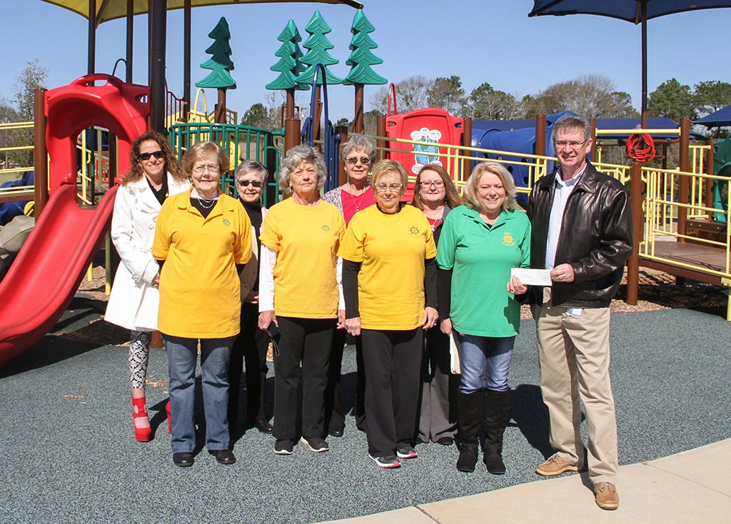 Messenger photo/SUBMITTEd The Troy Pilot Club recently made a $4,000 donation to the Troy Miracle League Playground to fund the purchase of a new table and umbrella. Pictured above are Pilot Club Members Angel Phelps, Margaret Oliver  Susan Richardson, Carolyn Barron, Karen Richardson, Carolyn Cobb, Tracey Davis , and Teresa Doty presenting the check to Dan Smith, director of the Troy Parks and Recreation Department. The Miracle League Playground is located at the Sportsplex on Enzor Road.