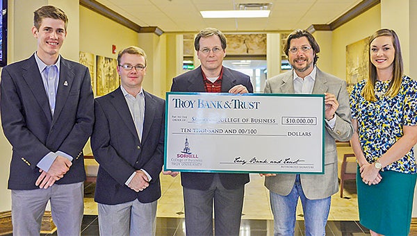 Troy Bank and Trust presented a check in the amount of $10,000 to the Sorrell College of Business. Pictured from left, Graham Pierce, TB&T intern; Austin Steen, TB&T intern; Jeff Kervin, president and CEO of TB&T, Dr. Judson Edwards, dean of the Sorrell College of Business; and Madeline Taylor, TB&T intern.  