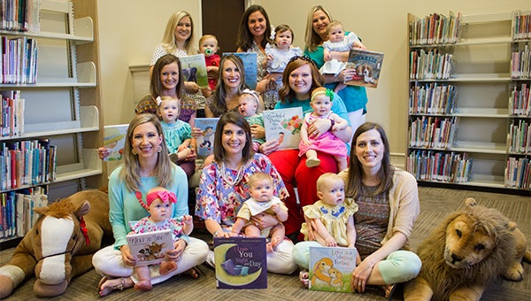 The Troy Junior Women’s League donated books to the Troy Public Library in honor of babies that were born to league members in 2015. Pictured, front from left, Alden Ward and Lillian Blythe; Dana Sanders and Joseph Davis; Jana Brown and Brooklyn Rose.  Middle row, Jordan Cox and Kinsley Faith; Lauren Cole and Chandler Margaret; Whitney Barron and Chandler Marie. Back row, Avie Medeiros and Mary Alice; Whitney Conrad and Caroline Jane; Nicole Godwin and Ann Scott.  