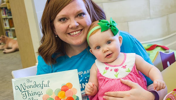 Whitney Barron and her daughter, Chandler Marie, were on hand last week for the Troy Junior Women’s League annual “Books for Babies” donation to the Troy Public LIbrary. The books are donated each year in honor of the members’ babies born that year. Inset below, Lauren Cole with her daughter, Chandler Margaret.