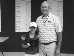 submitted Photo Susie Stell with Patriots head coach Gene Allen following play at the AISA State Championship in Greenville. Stell finished as the top female golfer for the third straight year.