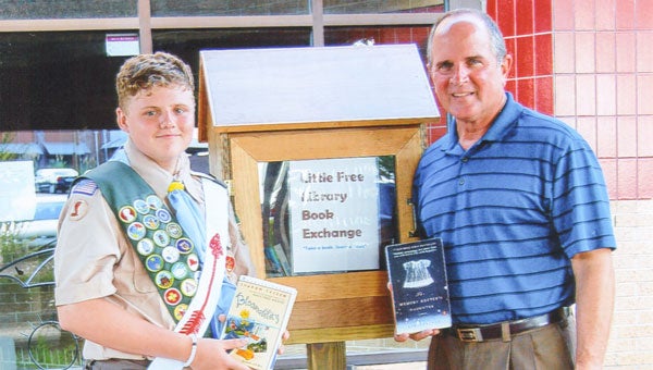Life Scout Loftin Worthington, a member of Boy Scout Troop 41 in Troy, has completed his Eagle Scout project, which included building a Little Free Library Exchange at the Charles Henderson Child Health Center. Loftin is working toward the rank of Eagle Scout, which is the highest rank in the Scouting program. He is pictured with Ben Busbee, CHCHC administrator.