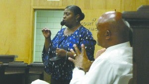 Messenger photo/jacob holmes Brundidge Mayoral Candidate Cynthia Pearson responds to a question during Thursday’s “Meet the Candidates” forum presented by the Pike County NAACP. Also pictured is Troy District 1 candidate Clarence Scott. 