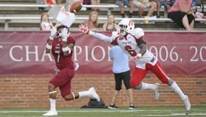 Photo/Thomas graning Troy receiver Hiram Velez hauls in a tuchdown pass during their season opening win over Austin Peay. The Trojans began the season without a lot of experience at the receiver position. As the season moves along the Trojans are getting more experienced game by game. 