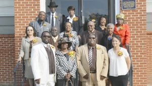 Pleasant Hill Missionary Baptist Church celebrated its 156th Church Anniversary Sunday. Special recognition was given to the Pleasant Hill Pioneers: Donald Caffie, Eva D. Calhoun, Tyrone Calhoun, James Foster, Arthur Griffin, Mildred Wilson Jones, Bessie Lampley, David Lampley, George “Jimmy” Lampley, Jean Lampley, Johnnie “Richard” Lampley, Ola Mae Lampley, Joyce Patterson, Martha Sue Thomas, Ina Wheeler, Betty Lampley Williams and John Lee Williams. Inset, the cemetery at Pleasant Hill Missionary Baptist Church was the burial ground for several slaves who probably attended services at the church. Sam Paul, who was born about 1830 and died in 1916, was the faithful servant of Robert Paul, Lt. Col with the 167th Ala. Reg. CSA. 