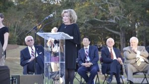 Janice Hawkins, First lady at Troy University, was the visionary behind the creation of a new International Arts Center and Cutlural Arts Park (named in her honor). The facilities were opened to the public on Friday, and hundreds of community leaders and students filled the amphitheater for the event. Above, Mrs. Hawkins speaks to the crowd while Chancellor Dr. Jack Hawkins, Artist Huo Bao Zhu and other dignataries listen. 