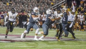 Messenger Photo/jonah enfinger Brandon Silvers runs for a 51-yard touchdown in Troy’s win over Appalachian on Saturday afternoon.