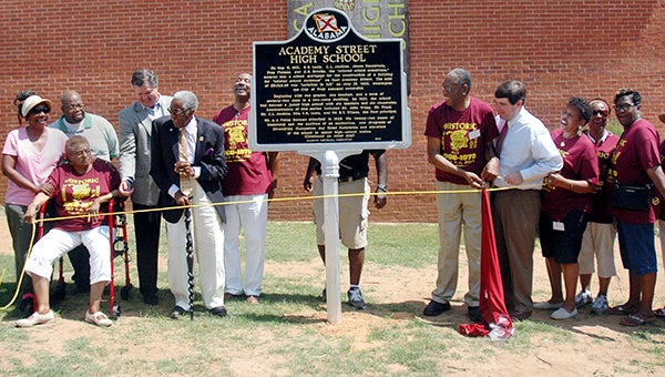 This file photo shows alumni of the Academy Street School during a reunion and historic marker dedication ceremony in July 2014. Residents in District 5 have long lobbied for rehabilitation and renovation of the historic school, and District 5 Councilwoman Wanda Moutlry said Thursday efforts are underway to renovate the school for new purposes.