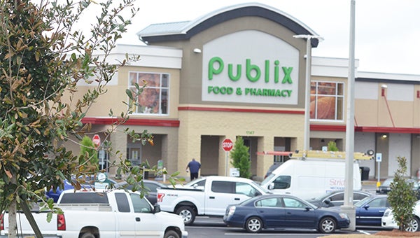 Publix will open at 8 a.m. on Saturday after a ribbon cutting ceremony at 7:45 a.m. Mayor Jason Reeves said the store has been something that residents have asked about for a long time, and its arrival can finally end the long wait. However, the opening is just the beginning for the Park Place development, which already has three more stores signed on to fill the empty spaces connectd to the grocery store. Inset: A map from Harbert Realty, the developer of Park PLace, shows where the new stores will be located.