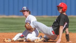 Photo/dan smith CHHS second baseman Grant Hughes shows the ball to the umpire as Hewitt Trussville baserunner Carson Skipper looks on. Inset: Devin Suddith was three-for-three in the second game against Bibb County Friday 